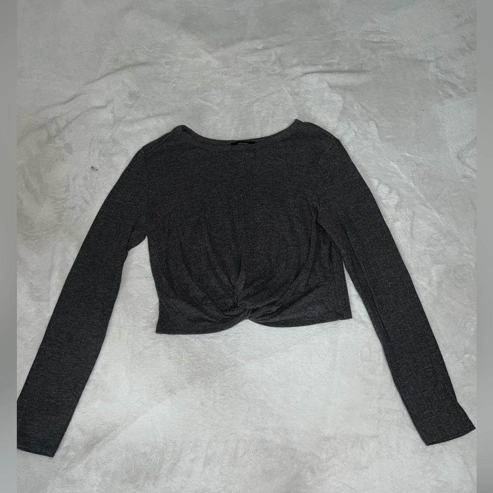 Brand new long sleeve top. Size L.